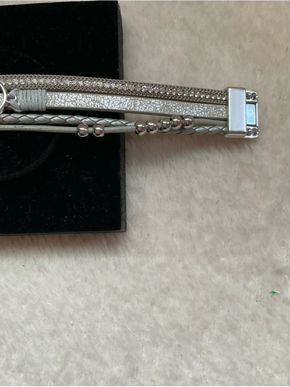 Silver Multi-Chain Bracelet with Interlocking Ring Accent